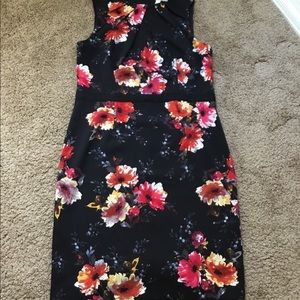 Black floral dress. Knee length.